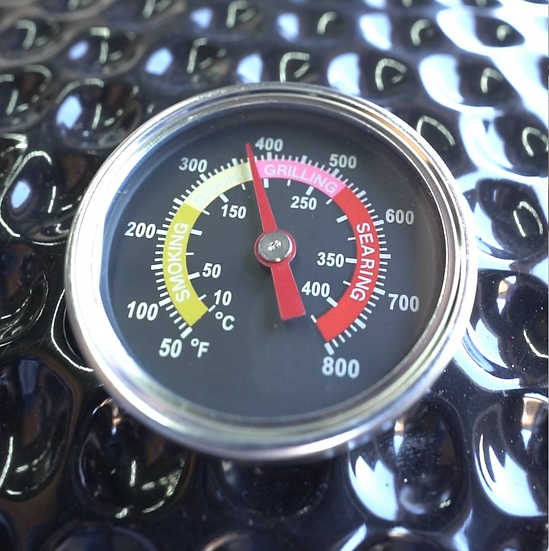 Temperature gauge on a black kamado