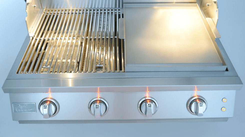 Stainless steel grill with four control knobs on a light blue background