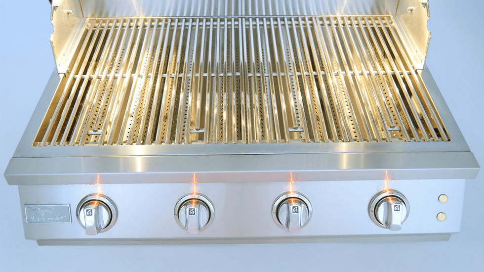 Stainless steel grill with four control knobs on a light blue background