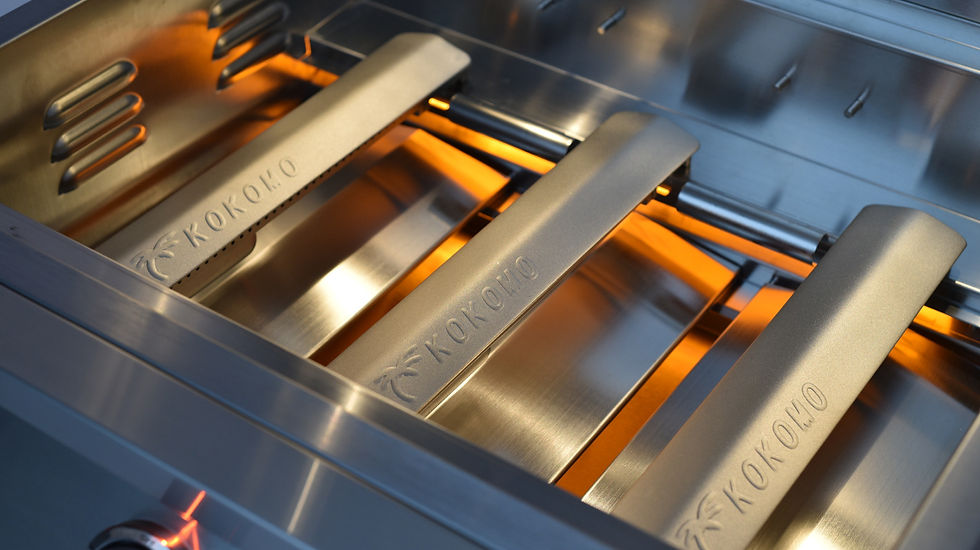 Close-up of a metallic kitchen component with 'Kokoro' branding.