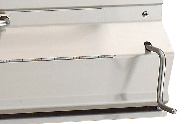Close-up of a white appliance with a metal handle on a white background