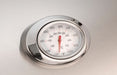 Metallic oven thermometer on a white background
