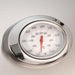 Metallic thermometer on a white background