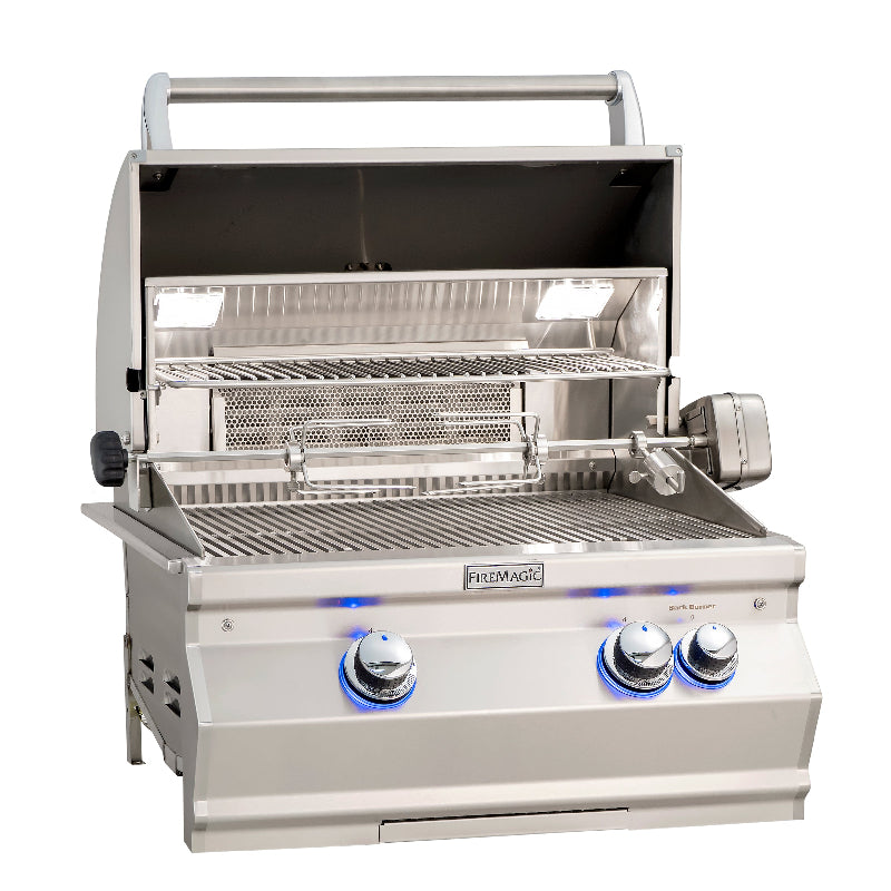Stainless steel grill with visible 'FireMagic' branding on a white background