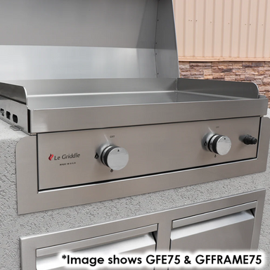 Stainless steel grill with Le Griddle branding on a concrete surface.