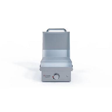 Stainless steel griddle on a white background