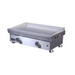 Stainless steel griddle on a white background