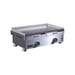 Stainless steel griddle on a white background