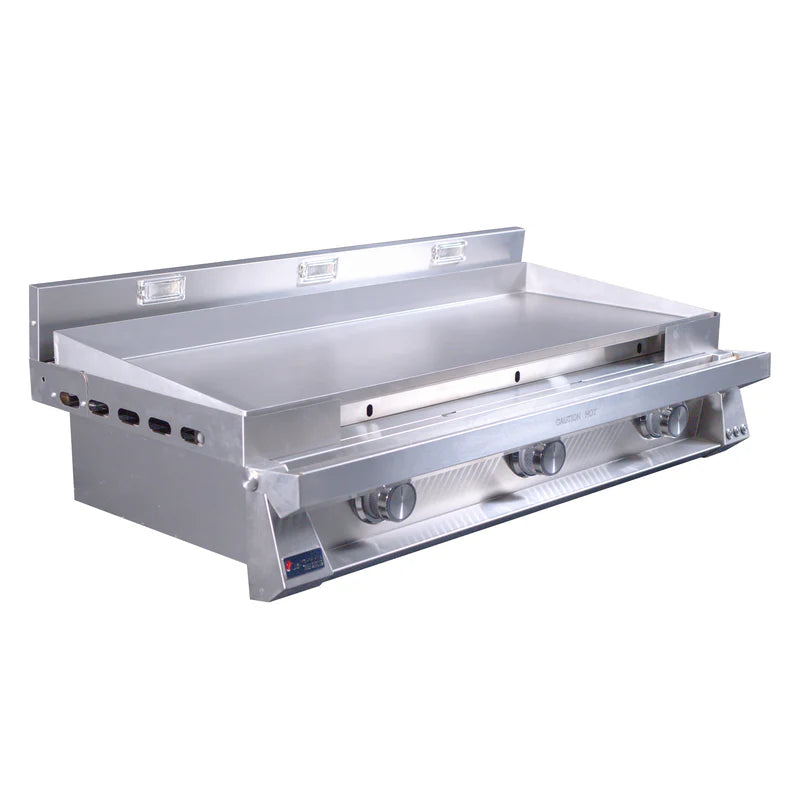 Stainless steel griddle on a white background