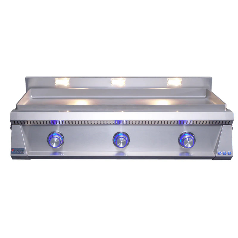 Stainless steel grill with three control knobs on a white background