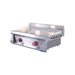 Stainless steel griddle with two red knobs on a white background