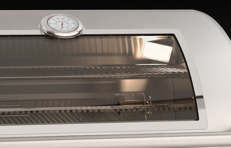 Stainless steel grill with glass door and thermometer on a black background