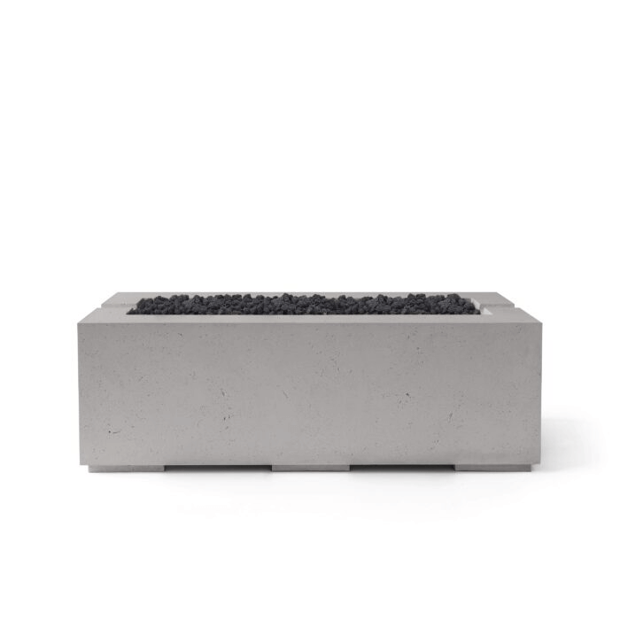 Rectangular concrete firepit with black lava rock and sandstone concrete finish